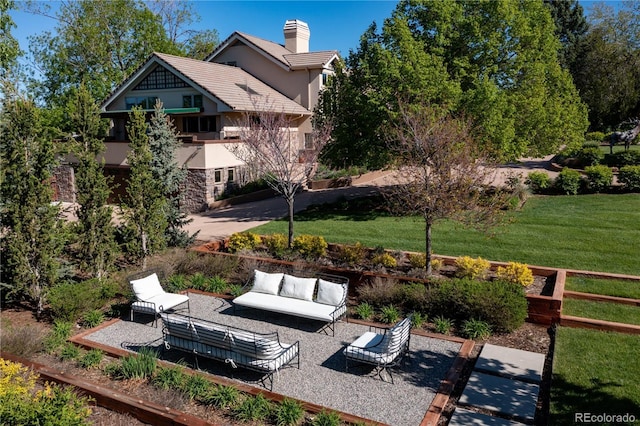 exterior space featuring outdoor lounge area and a patio