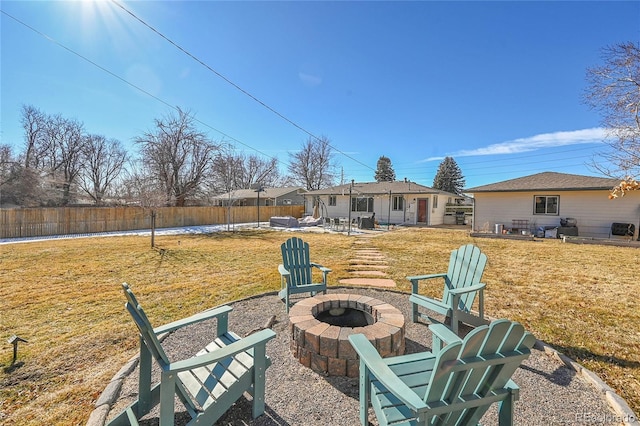 view of yard with a patio and an outdoor fire pit