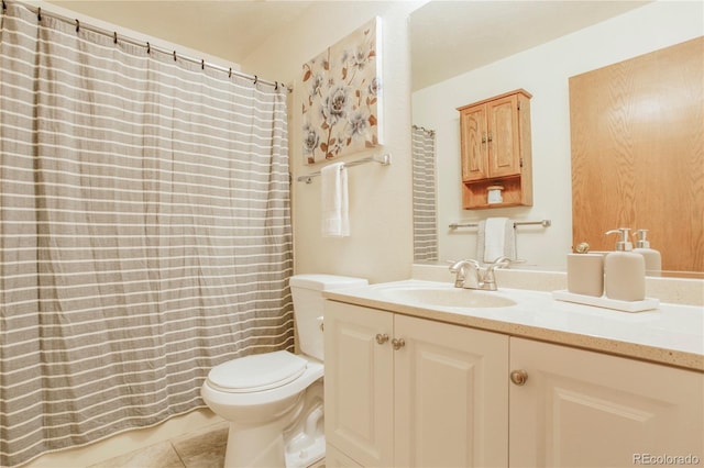 full bath with vanity, tile patterned flooring, and toilet