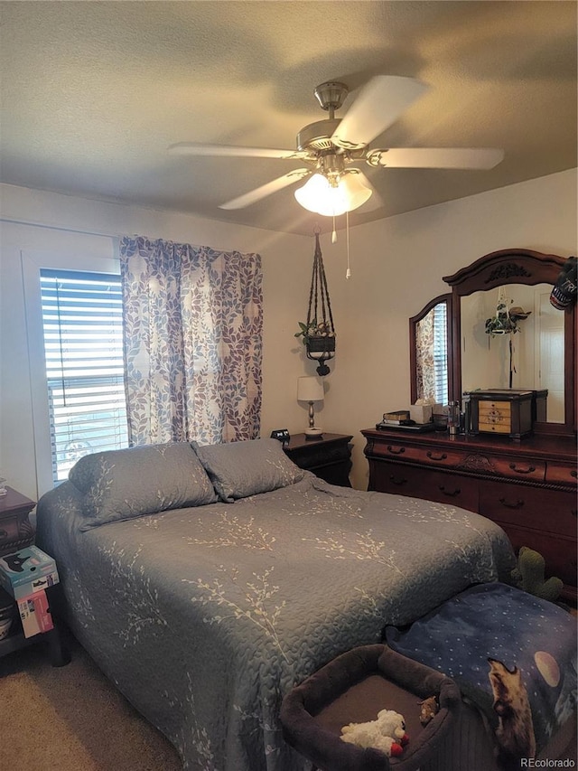 bedroom featuring carpet flooring and ceiling fan