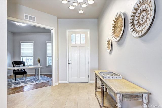 365 Casalon Pl, Superior, CO 80027 - entryway featuring baseboards and a chandelier