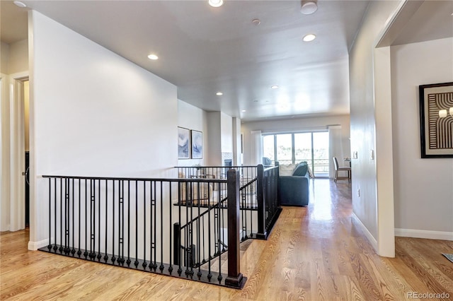 365 Casalon Pl, Superior, CO 80027 - corridor with an upstairs landing, wood finished floors, baseboards, and recessed lighting