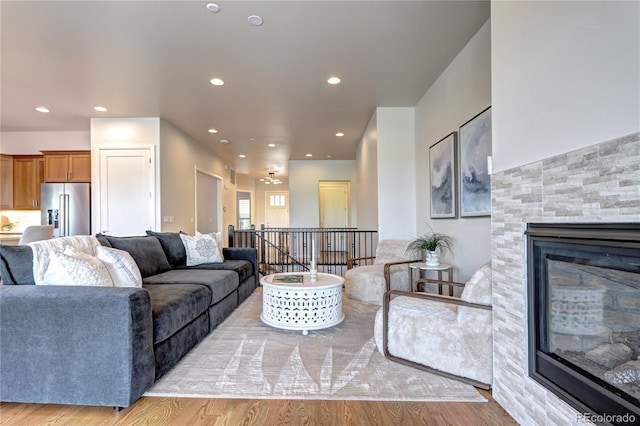 365 Casalon Pl, Superior, CO 80027 - living area with wood finished floors, recessed lighting, and a fireplace