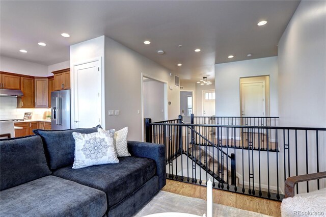 365 Casalon Pl, Superior, CO 80027 - living room featuring light wood-style flooring and recessed lighting