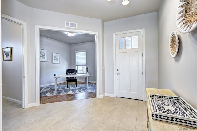 365 Casalon Pl, Superior, CO 80027 - entryway with healthy amount of natural light, light wood-type flooring, and baseboards