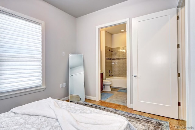 365 Casalon Pl, Superior, CO 80027 - bedroom featuring wood finished floors, baseboards, and ensuite bath