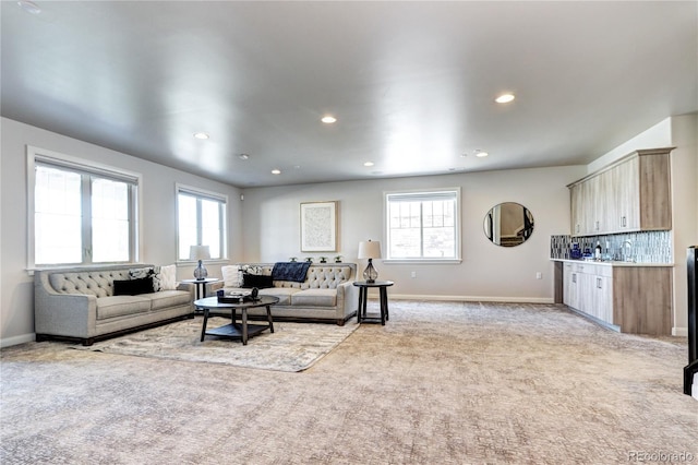 365 Casalon Pl, Superior, CO 80027 - living area with healthy amount of natural light, light colored carpet, recessed lighting, and baseboards