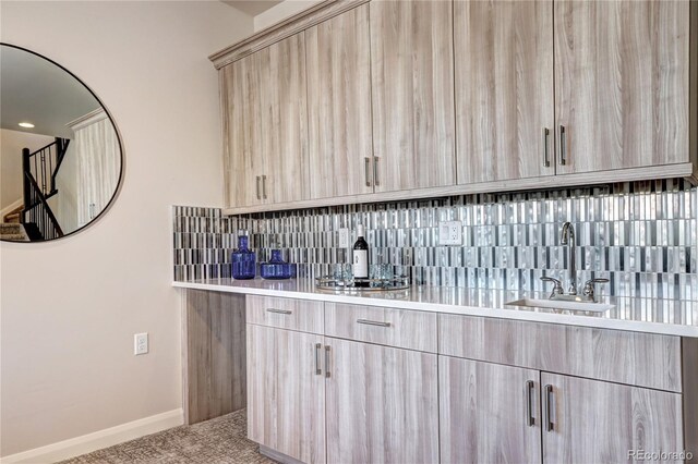 365 Casalon Pl, Superior, CO 80027 - bar with a sink, tasteful backsplash, baseboards, and carpet