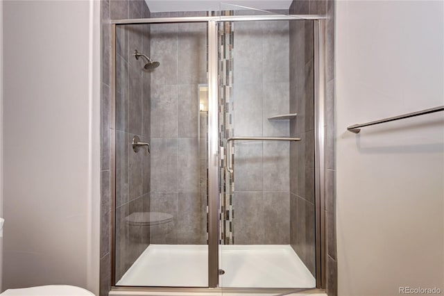365 Casalon Pl, Superior, CO 80027 - bathroom with a shower stall and toilet