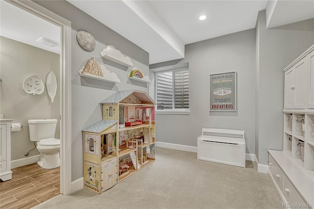 playroom featuring light hardwood / wood-style floors