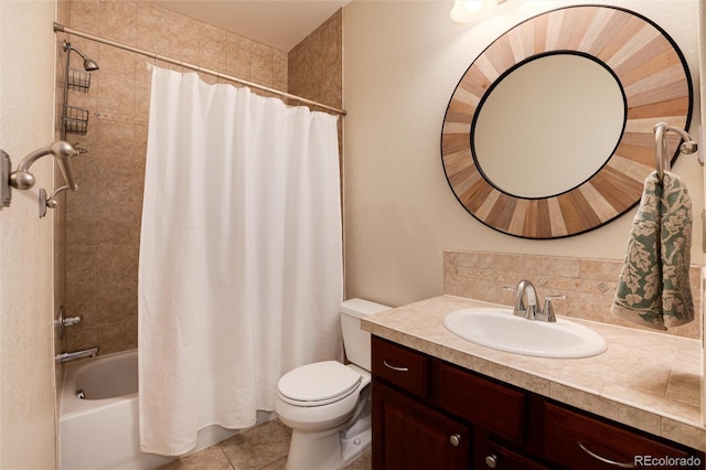 full bathroom featuring tile patterned flooring, vanity, toilet, and shower / tub combo with curtain