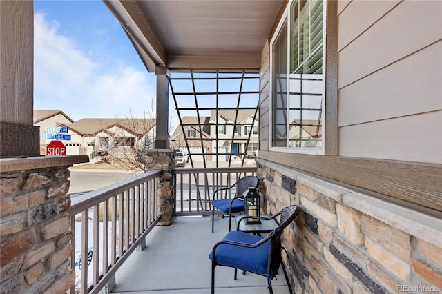 balcony featuring a residential view