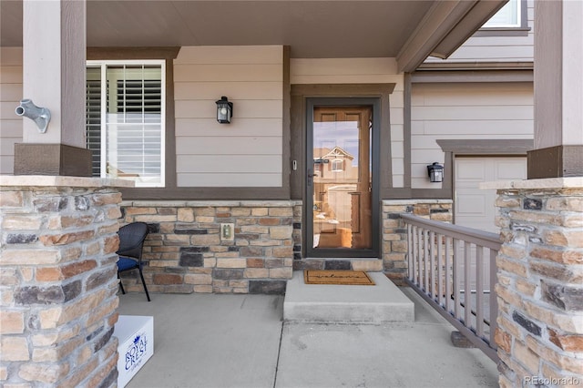 entrance to property with stone siding