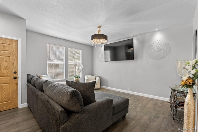 9758 Laredo St Unit 18D, Commerce City, CO 80022 - living room with baseboards, recessed lighting, dark wood-style flooring, and a chandelier