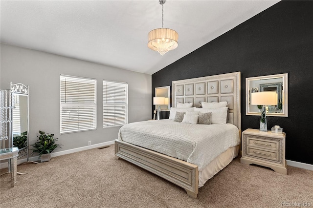 9758 Laredo St Unit 18D, Commerce City, CO 80022 - bedroom featuring light colored carpet, baseboards, vaulted ceiling, and visible vents