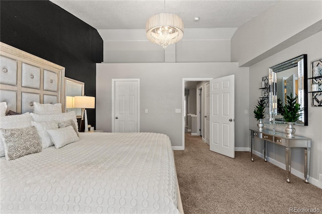 9758 Laredo St Unit 18D, Commerce City, CO 80022 - bedroom featuring baseboards, a chandelier, carpet, and a towering ceiling