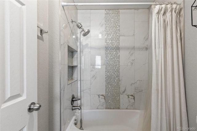 9758 Laredo St Unit 18D, Commerce City, CO 80022 - full bath featuring a textured wall and shower / bath combo