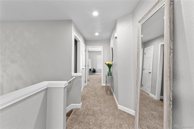 9758 Laredo St Unit 18D, Commerce City, CO 80022 - hall with recessed lighting, carpet, baseboards, and an upstairs landing