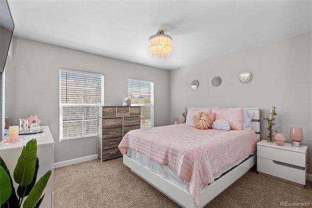 9758 Laredo St Unit 18D, Commerce City, CO 80022 - bedroom with carpet floors and baseboards