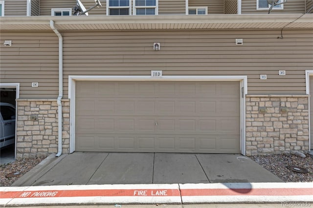 9758 Laredo St Unit 18D, Commerce City, CO 80022 - view of garage