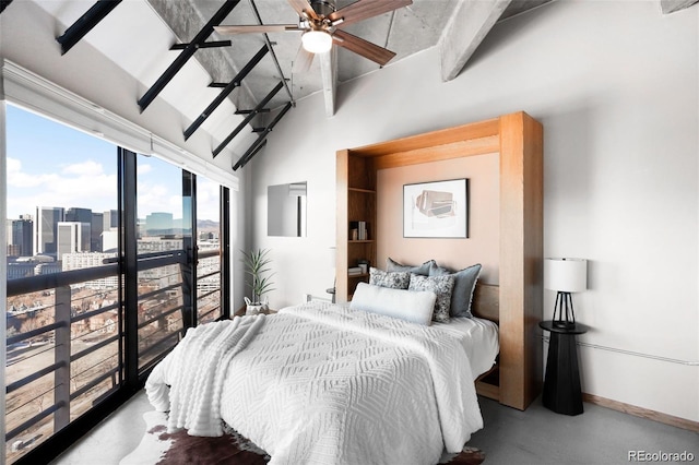 100 Park Ave Unit 2008, Denver, CO 80205 - bedroom featuring a view of skyline and finished concrete floors
