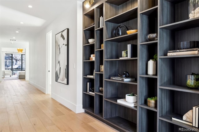 hallway featuring light hardwood / wood-style flooring