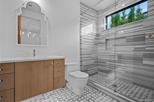 bathroom with walk in shower, vanity, toilet, and a chandelier