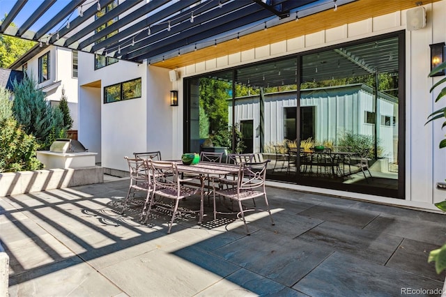 view of patio / terrace featuring grilling area and a pergola