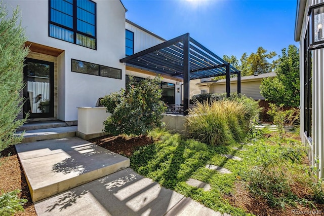 exterior space with a pergola