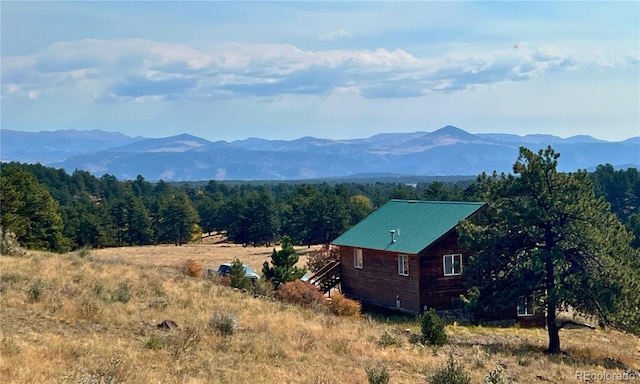 mountain view featuring a rural view