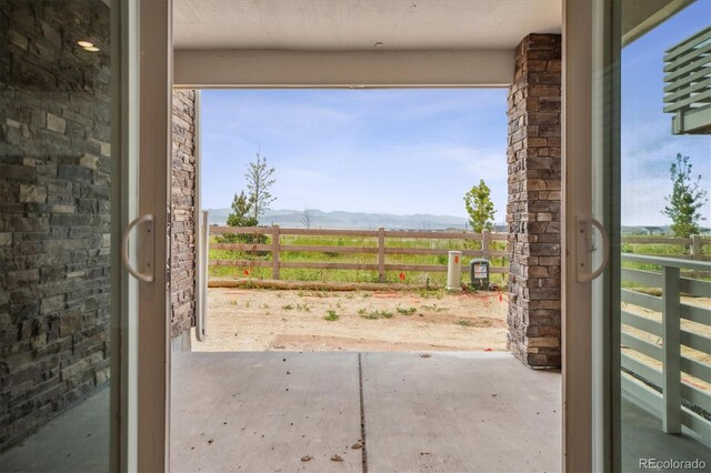 8245 Butte Creek St, Littleton, CO 80125 - view of patio with a mountain view