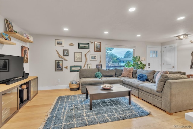 3163 S Boston Ct, Denver, CO 80231 - living area with recessed lighting, light wood-type flooring, and baseboards