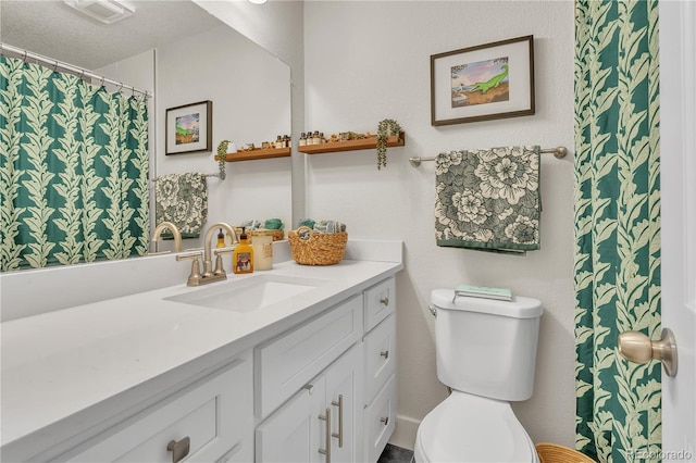 3163 S Boston Ct, Denver, CO 80231 - bathroom with toilet and vanity