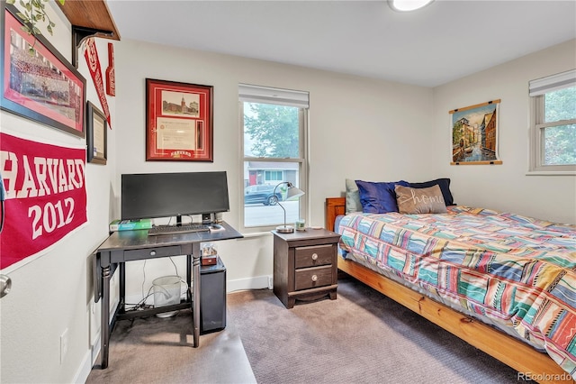 3163 S Boston Ct, Denver, CO 80231 - carpeted bedroom featuring a desk and baseboards