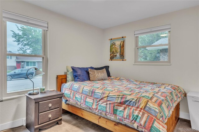 3163 S Boston Ct, Denver, CO 80231 - bedroom featuring carpet floors and baseboards