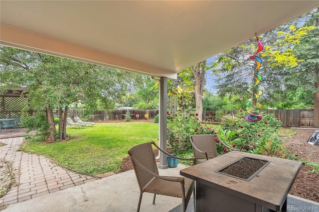 3163 S Boston Ct, Denver, CO 80231 - view of patio / terrace with a fire pit