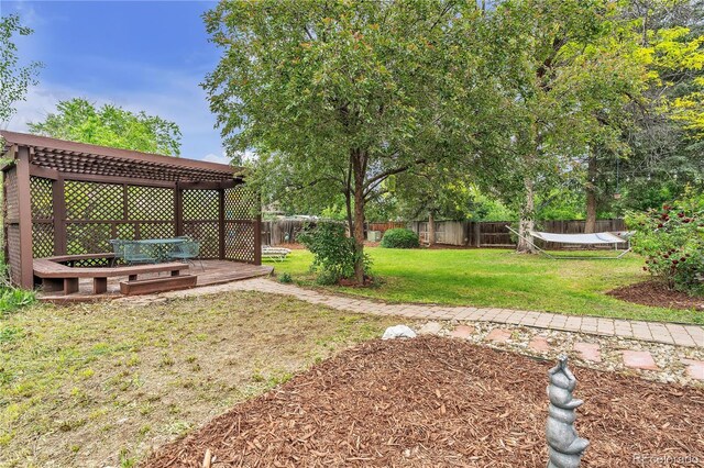 3163 S Boston Ct, Denver, CO 80231 - view of yard with a pergola and a deck