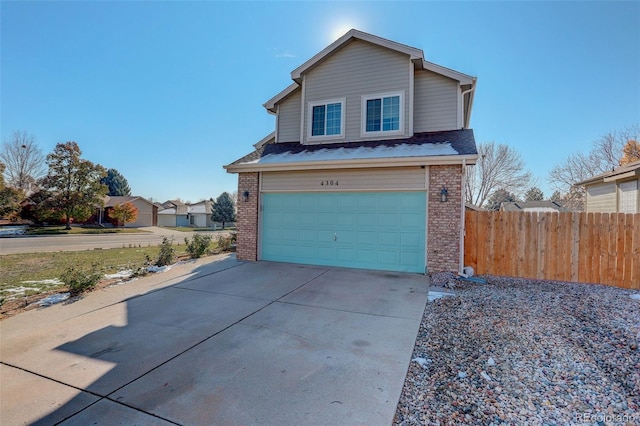 view of front of property featuring a garage