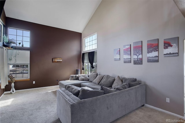 living room with carpet flooring and high vaulted ceiling