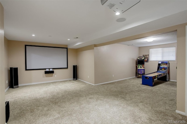 cinema room with light colored carpet