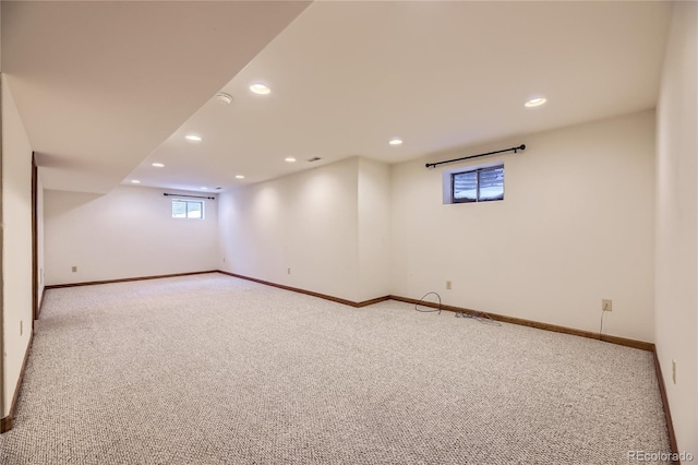 basement with light carpet