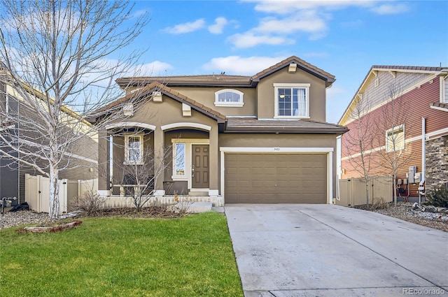 3423 Rosewood Ln, Johnstown, CO 80534 - traditional-style home featuring a front lawn, fence, stucco siding, an attached garage, and driveway