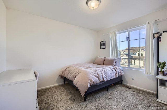 3423 Rosewood Ln, Johnstown, CO 80534 - carpeted bedroom featuring baseboards