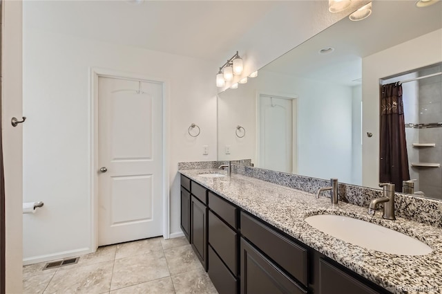 3423 Rosewood Ln, Johnstown, CO 80534 - full bathroom with baseboards, tile patterned floors, visible vents, and a sink