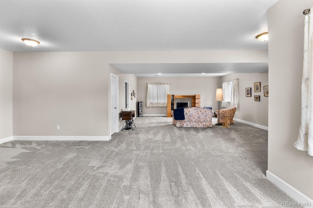 2060 Peralta Loop, Castle Rock, CO 80104 - carpeted living room with a fireplace and baseboards