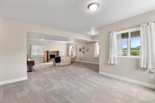2060 Peralta Loop, Castle Rock, CO 80104 - unfurnished living room featuring carpet floors, baseboards, and a fireplace