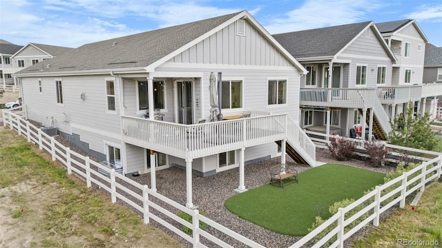 2060 Peralta Loop, Castle Rock, CO 80104 - rear view of house featuring board and batten siding, stairway, a shingled roof, and a deck