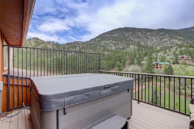 178 Cree Ct, Lyons, CO 80540 - wooden terrace featuring a hot tub and a mountain view