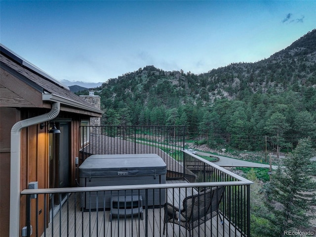178 Cree Ct, Lyons, CO 80540 - deck with a mountain view, a forest view, and a covered hot tub