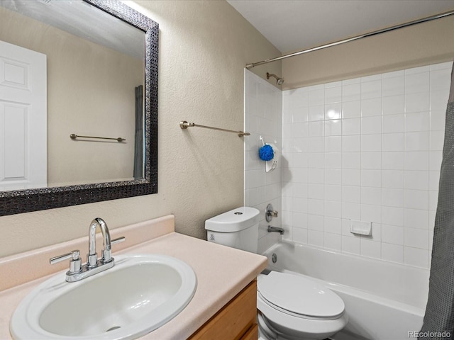 full bathroom with toilet, shower / bath combo with shower curtain, and vanity